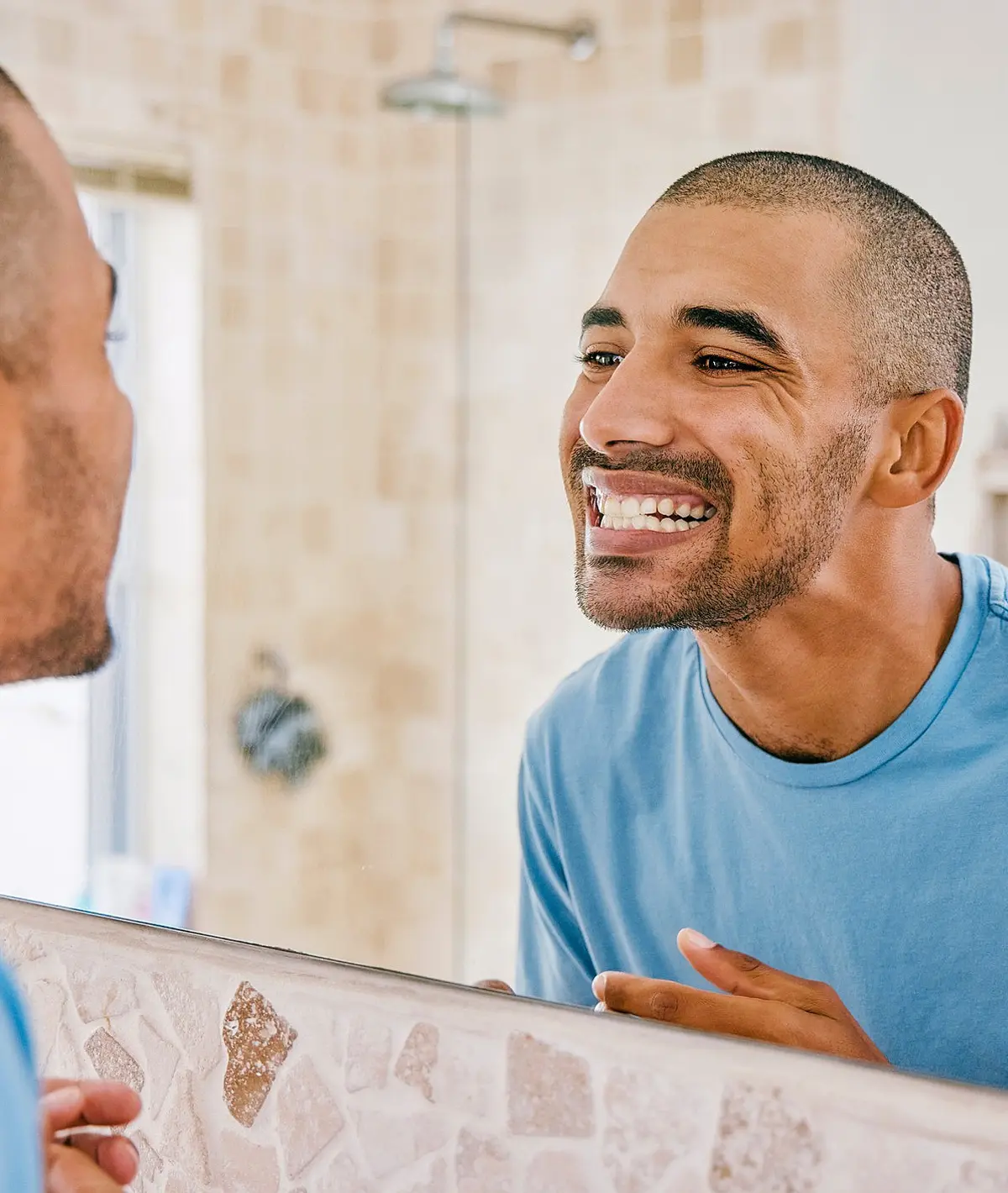 Patient smiling after affordable dental treatment