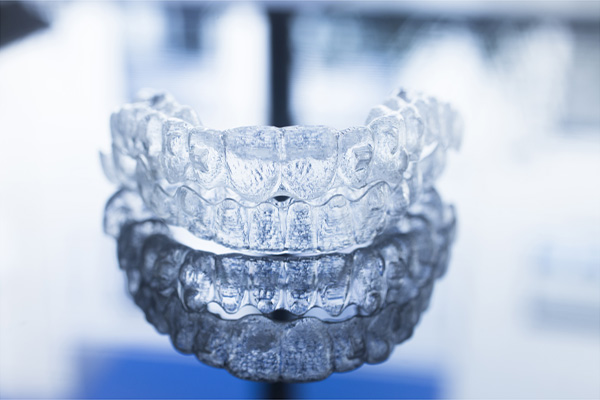 Invisible dental braces on a table.